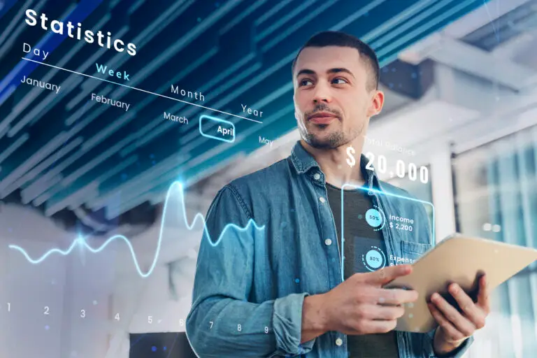 Homem usando tablet com gráficos digitais e estatísticas financeiras simuladas, representando o uso da Inteligência Artificial na Gestão para tomada de decisões em tempo real.